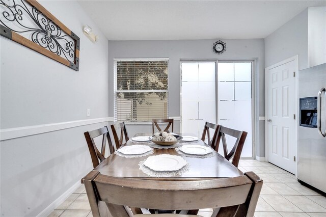 view of tiled dining space