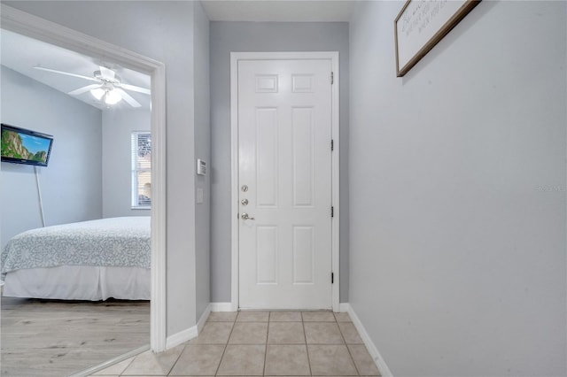 interior space with light hardwood / wood-style floors and ceiling fan