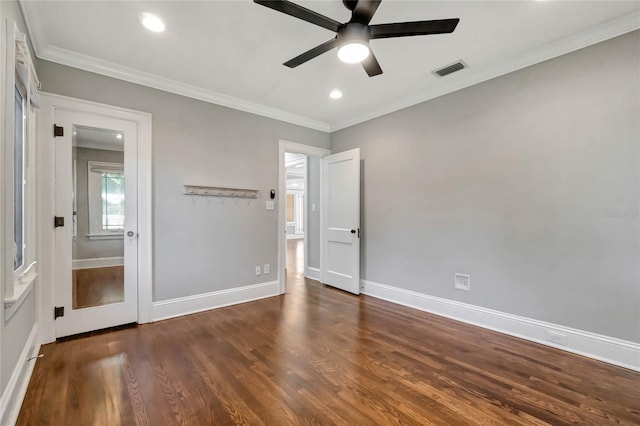 unfurnished bedroom with ceiling fan, dark hardwood / wood-style flooring, and crown molding