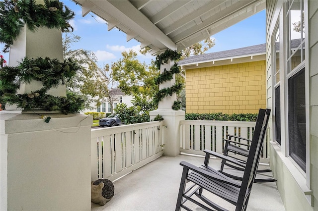 balcony featuring a porch