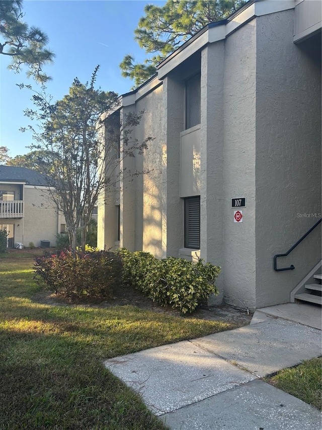 view of home's exterior featuring a yard