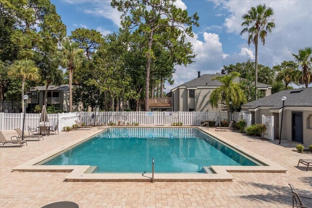 view of pool featuring a patio