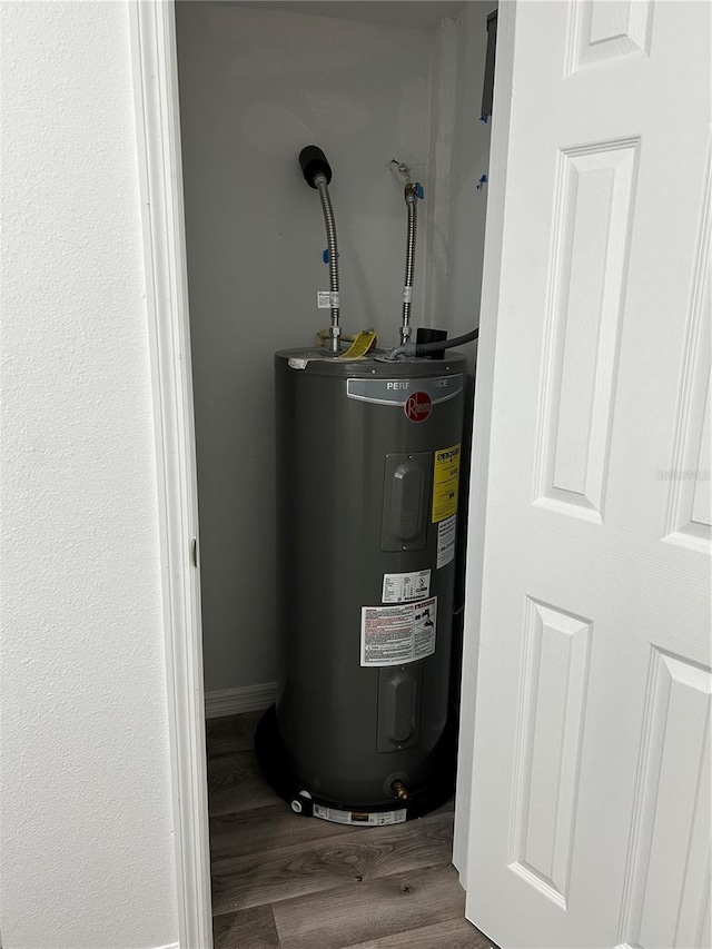 utility room with water heater