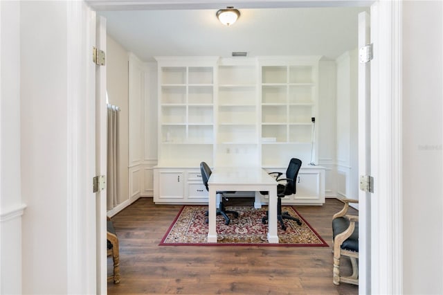 office space with dark hardwood / wood-style floors