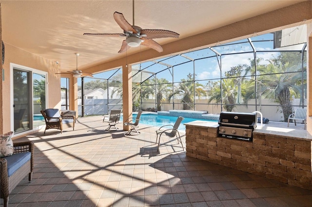 exterior space featuring a lanai, a grill, ceiling fan, and exterior kitchen