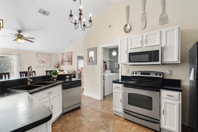 kitchen featuring white cabinetry, sink, stainless steel appliances, and ceiling fan with notable chandelier