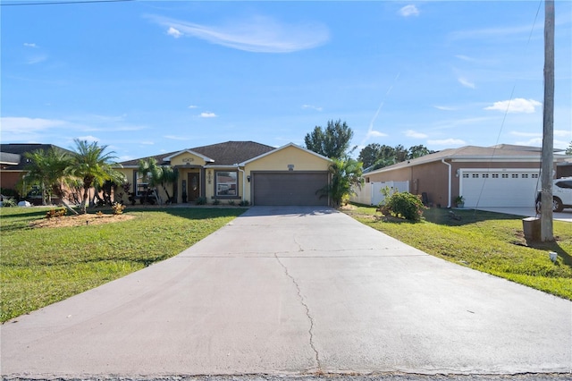 single story home with a front yard and a garage