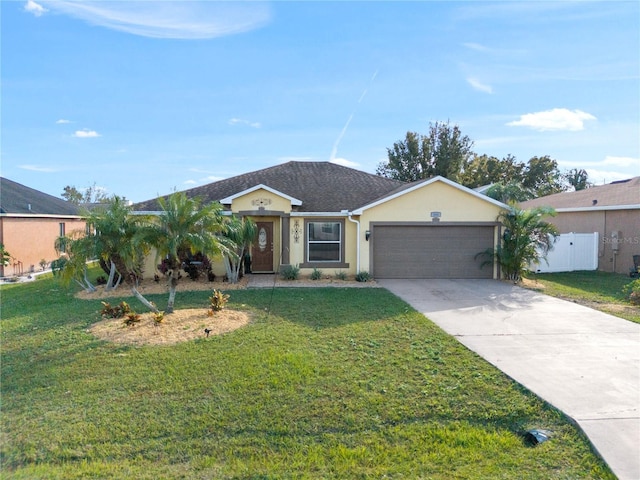 single story home with a front yard and a garage