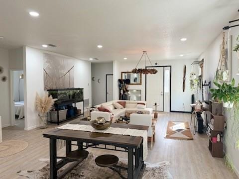 dining room with light hardwood / wood-style floors