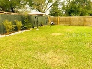 view of yard featuring a playground