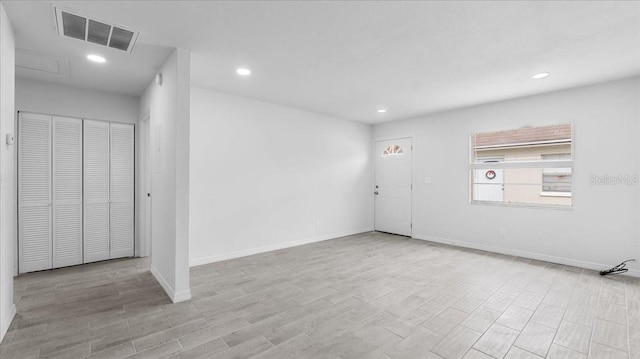 empty room featuring light hardwood / wood-style floors