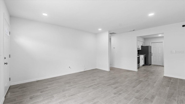 empty room featuring light hardwood / wood-style flooring