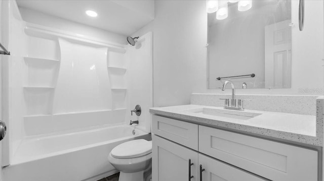 full bathroom with shower / bathing tub combination, vanity, and toilet