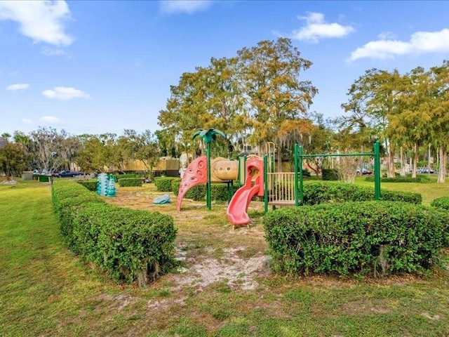 view of play area featuring a lawn