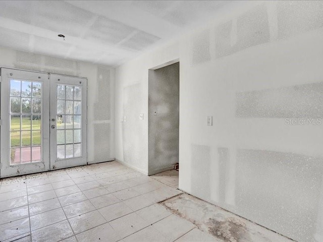 spare room with french doors