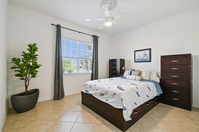 bedroom featuring ceiling fan and light tile patterned floors