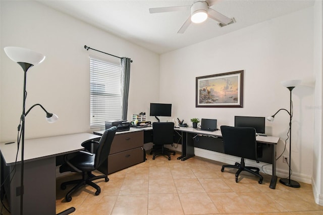 tiled home office with ceiling fan