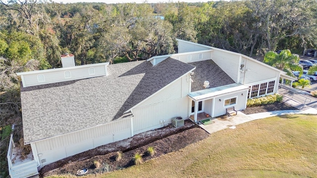 aerial view with a wooded view