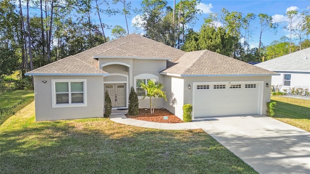 view of front of property with an attached garage, stucco siding, a shingled roof, and a front yard