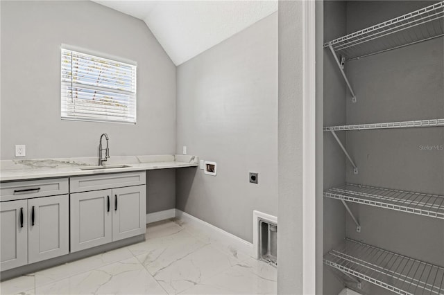 laundry room with washer hookup, marble finish floor, hookup for an electric dryer, a sink, and laundry area