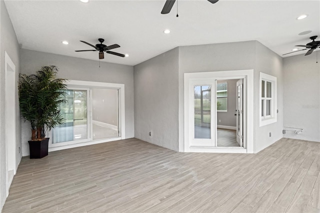 unfurnished living room featuring light wood-type flooring, ceiling fan, and recessed lighting