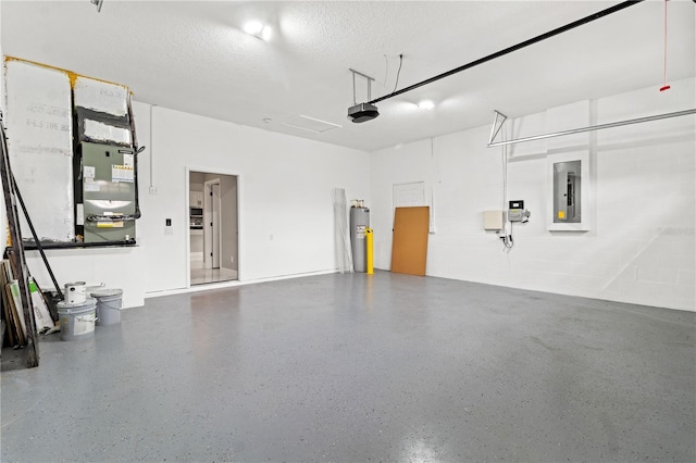 garage featuring electric panel, electric water heater, and a garage door opener