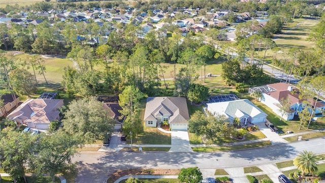 birds eye view of property with a residential view