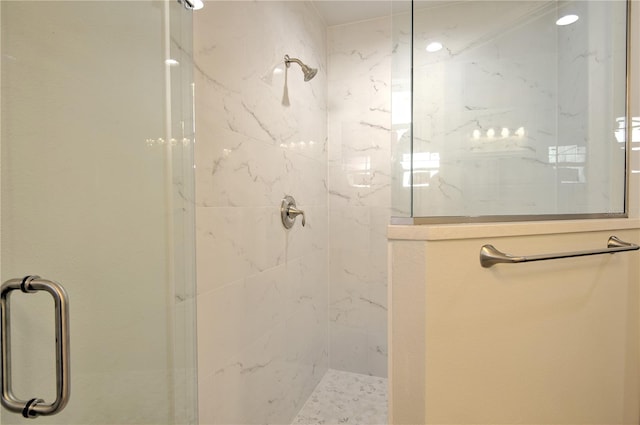 bathroom featuring an enclosed shower