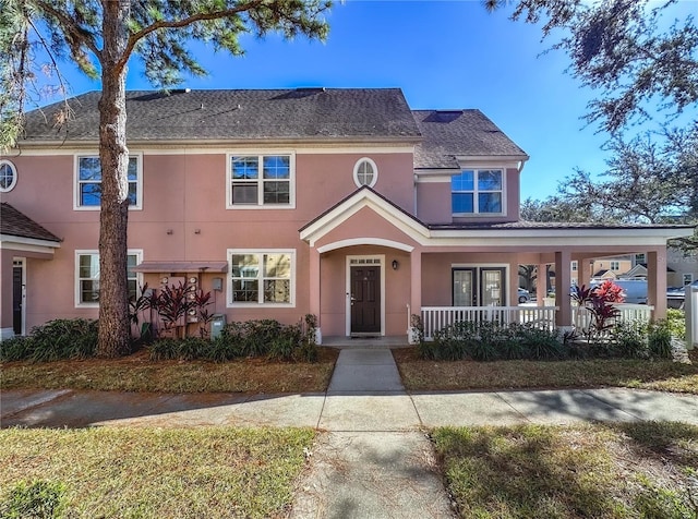 3383 Westchester Square Blvd Unit 202, Orlando, FL 32835 - multi unit property featuring a porch and stucco siding