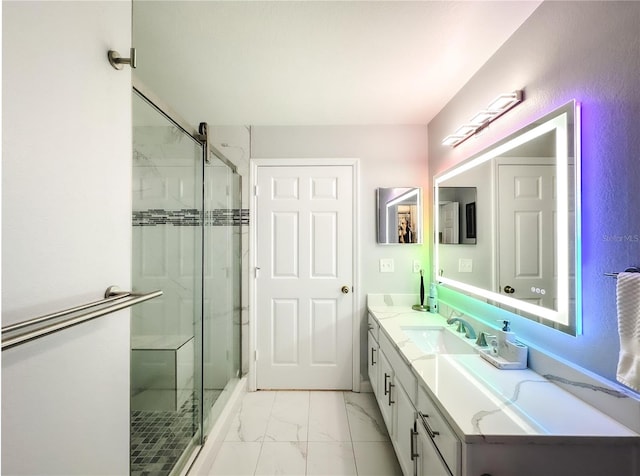 3383 Westchester Square Blvd Unit 202, Orlando, FL 32835 - full bath featuring a shower stall, marble look tiles, and double vanity