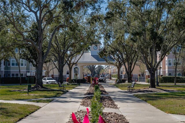 view of home's community featuring a yard