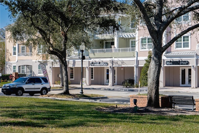 exterior space featuring a front lawn