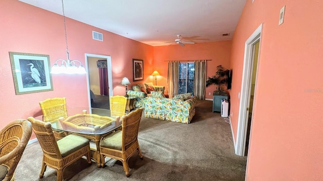 dining room featuring carpet flooring and ceiling fan