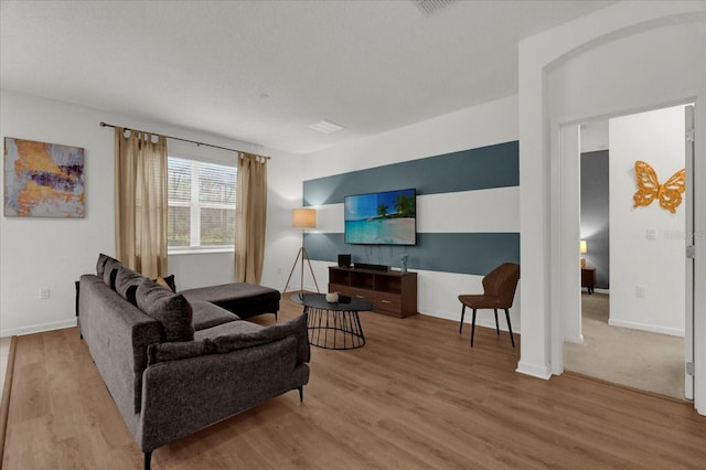 living room with hardwood / wood-style flooring