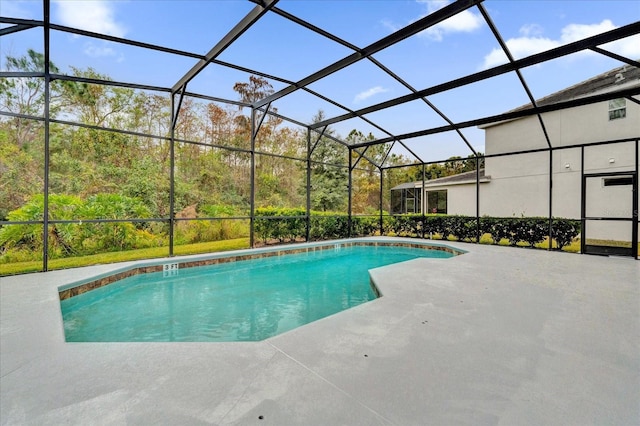 view of pool featuring a patio and a lanai