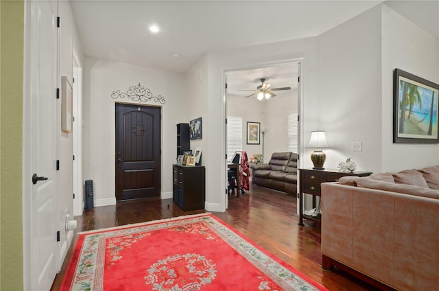 entrance foyer featuring ceiling fan and dark hardwood / wood-style floors