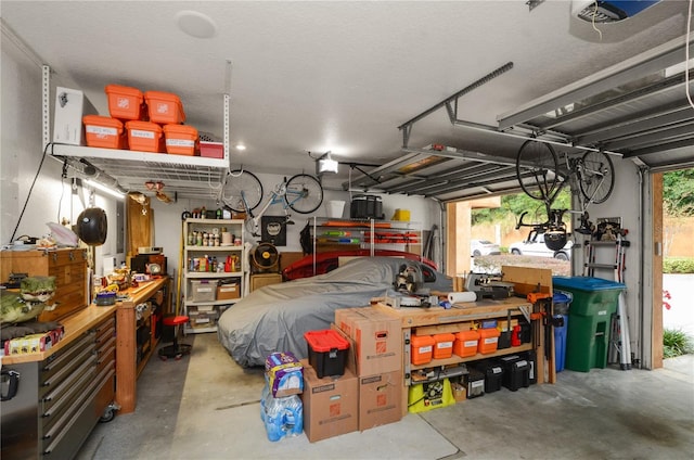 garage with a workshop area