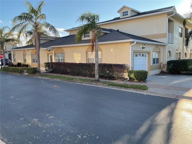 view of front of property featuring a garage