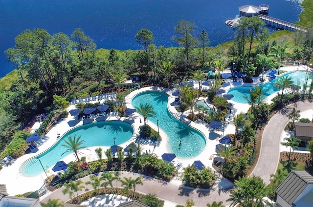 birds eye view of property featuring a water view