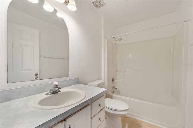 full bathroom with shower / tub combination, tile patterned flooring, vanity, and toilet