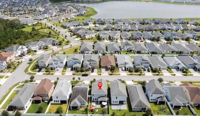 drone / aerial view featuring a water view