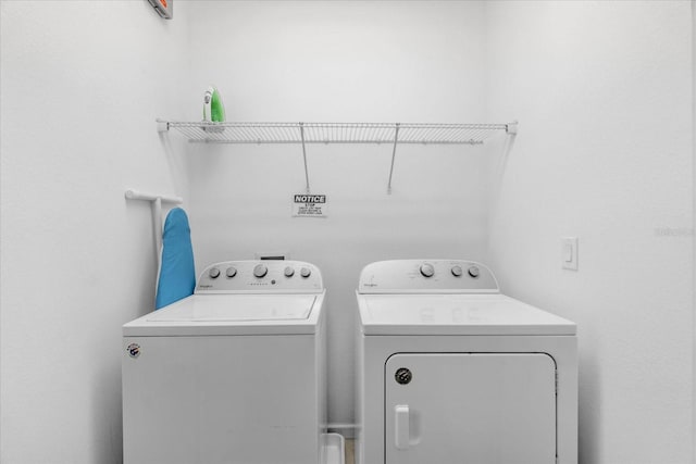 laundry area with washer and dryer