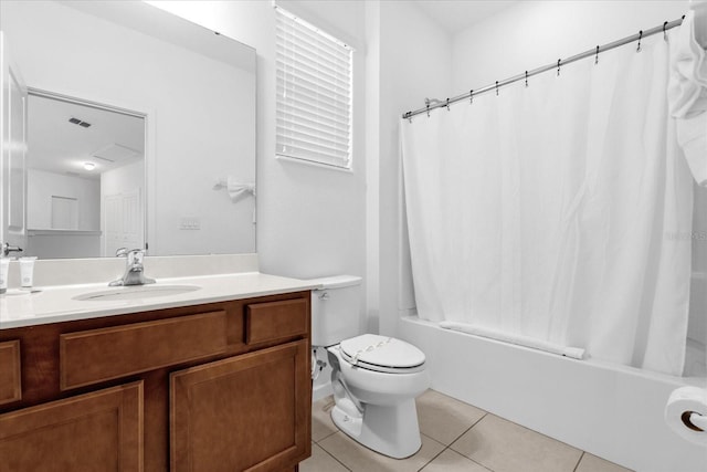 full bathroom featuring tile patterned floors, vanity, toilet, and shower / bathtub combination with curtain