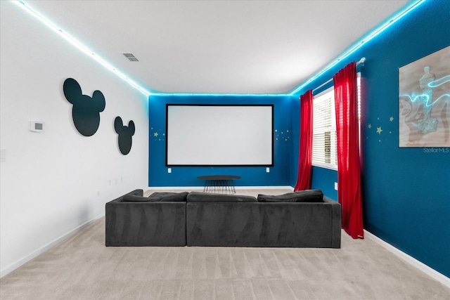 cinema room with light colored carpet