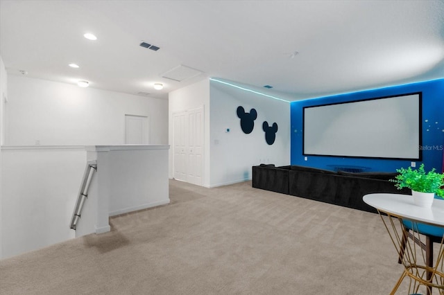 home theater with light colored carpet