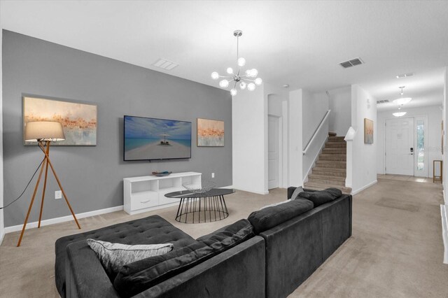 4501 Monado Dr, Kissimmee, FL 34746 - carpeted living room with visible vents, baseboards, stairs, and an inviting chandelier