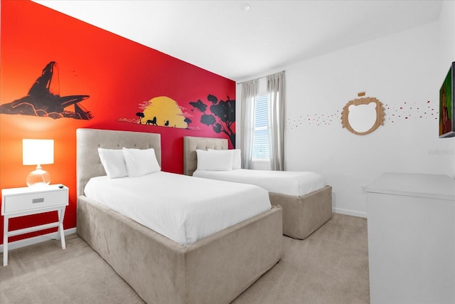 4501 Monado Dr, Kissimmee, FL 34746 - carpeted bedroom featuring an accent wall and baseboards