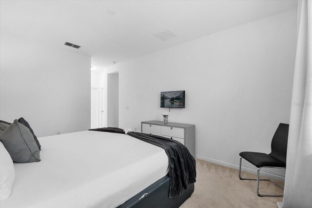 4501 Monado Dr, Kissimmee, FL 34746 - bedroom with baseboards, visible vents, and light carpet