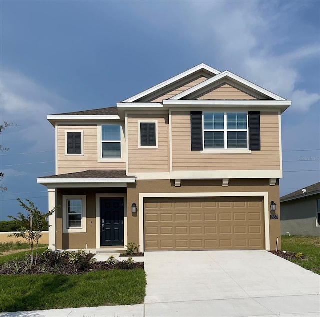 view of front of property featuring a garage