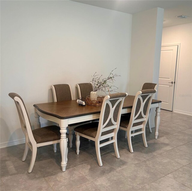 view of tiled dining room